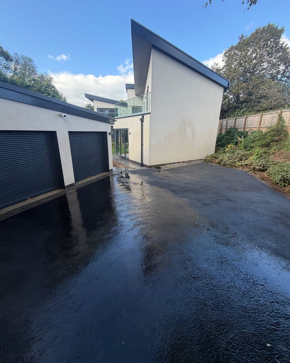 Freshly cleaned white render on a modern house in Cleckheaton